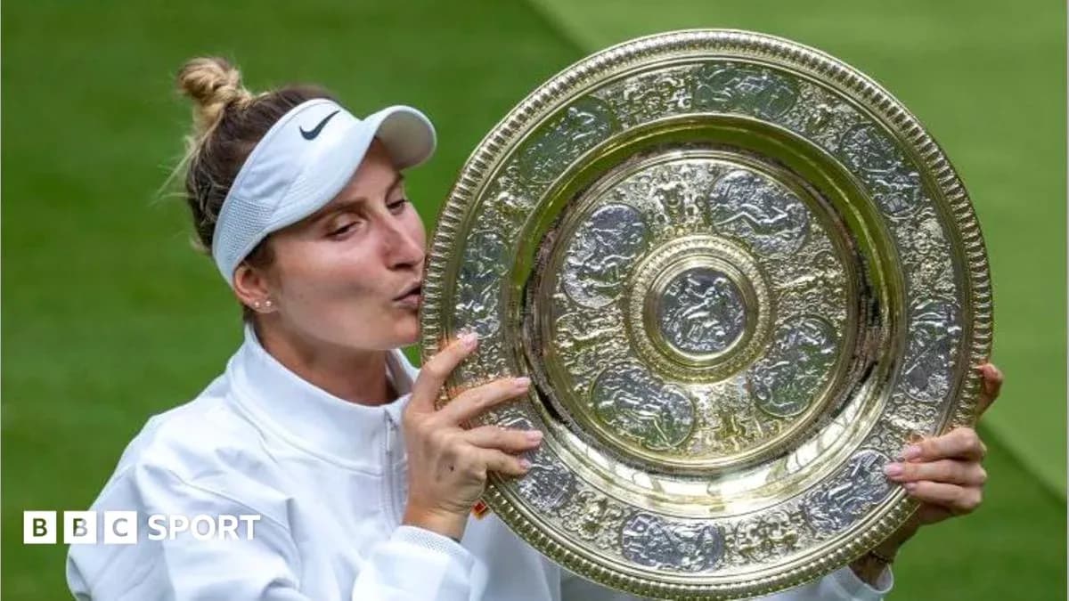 Tennis player kissing trophy after winning championship