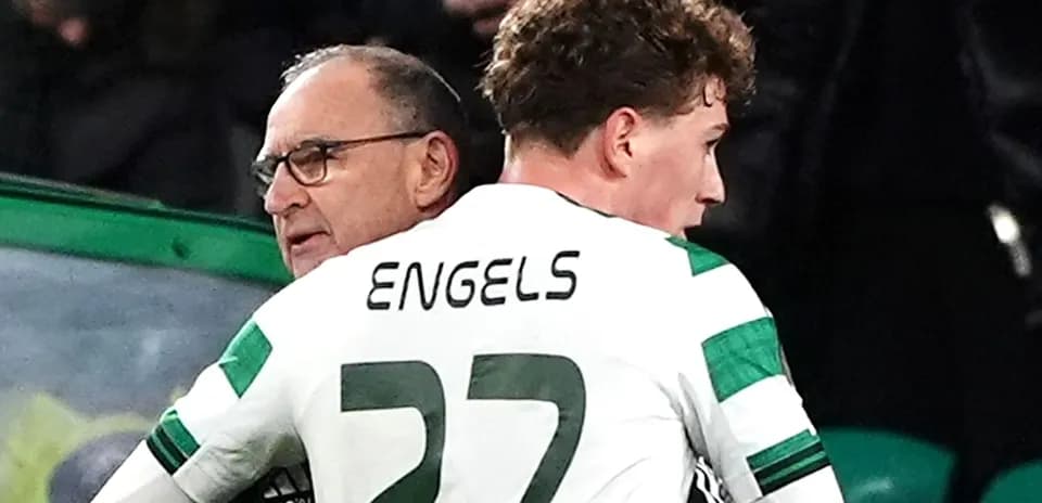 Celtic player ENGELS talking to coach during match