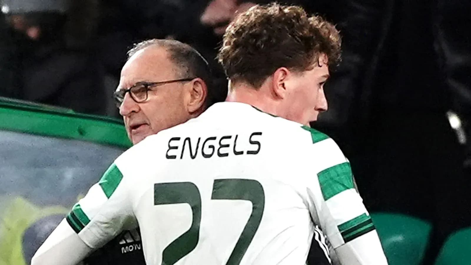 Celtic player ENGELS talking to coach during match