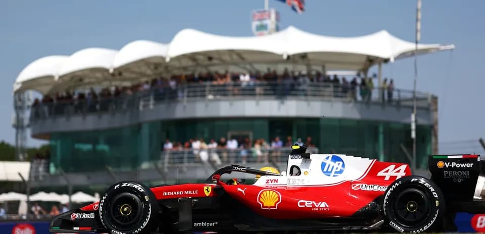 Formula 1 car racing with spectators in background