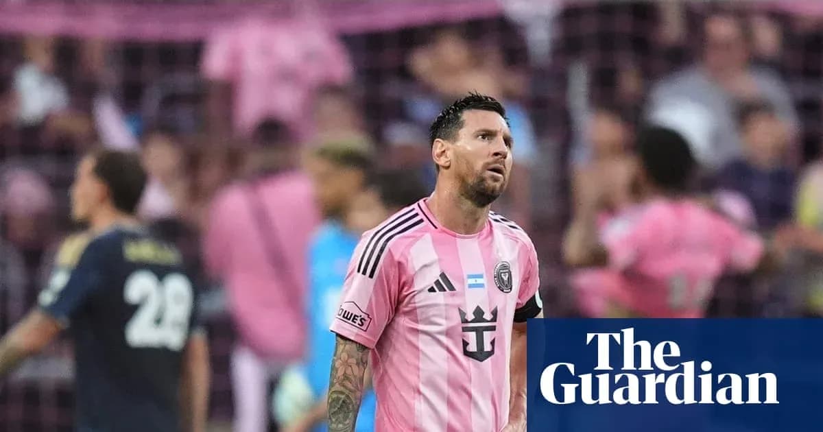 Lionel Messi in pink jersey during match