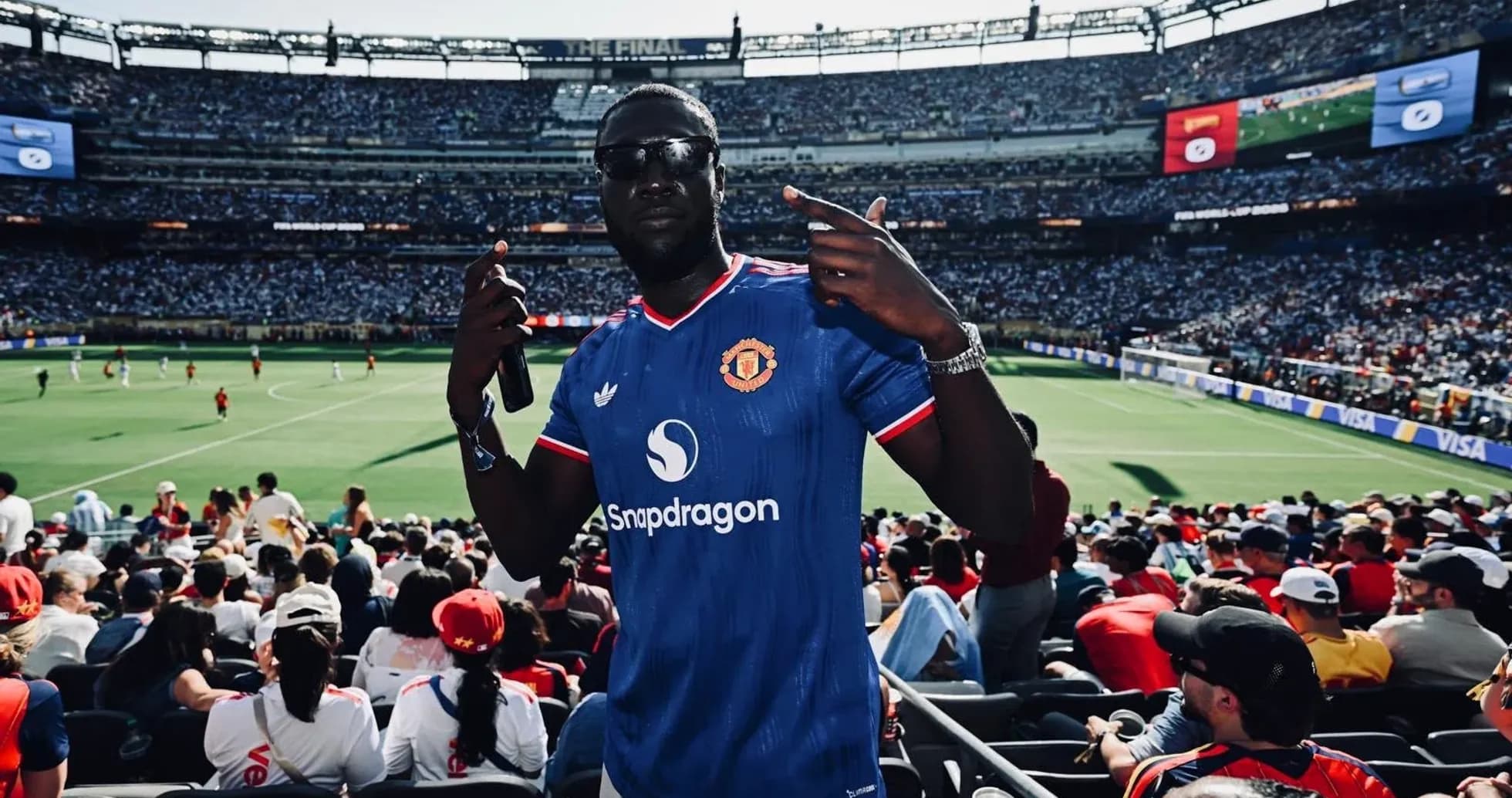 Fan wearing Manchester United jersey at stadium