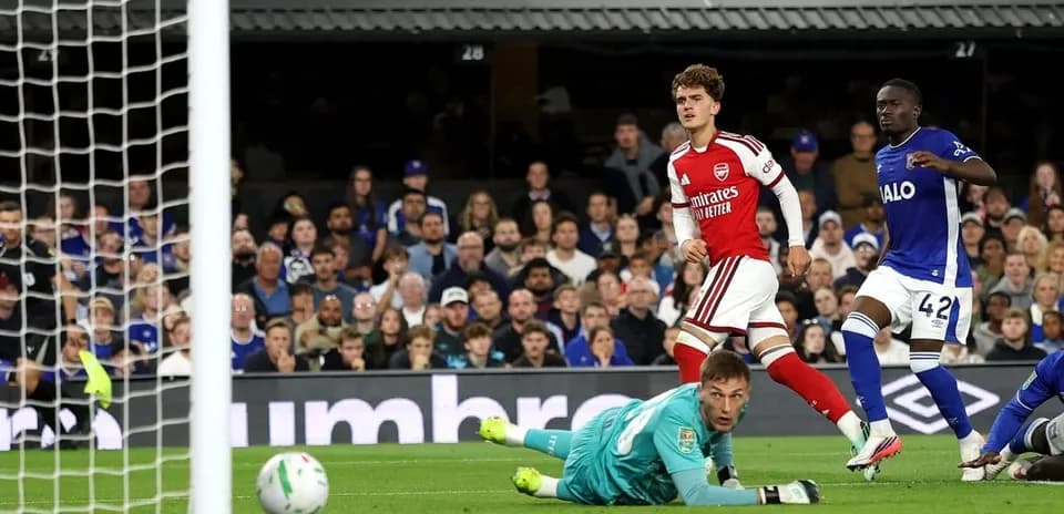 Arsenal player celebrating after scoring a goal