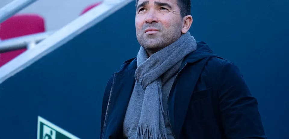 Person looking up while wearing a scarf