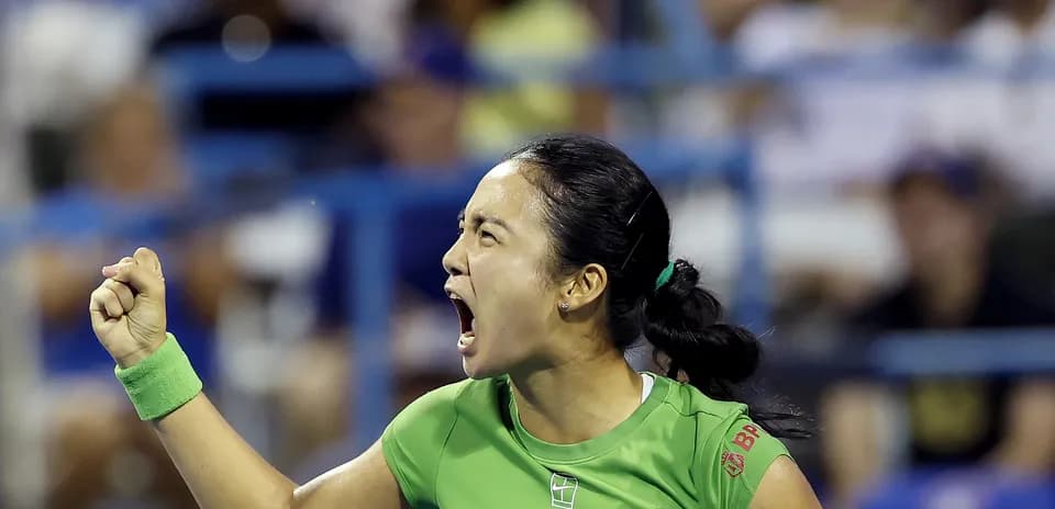 Tennis player celebrating with clenched fist