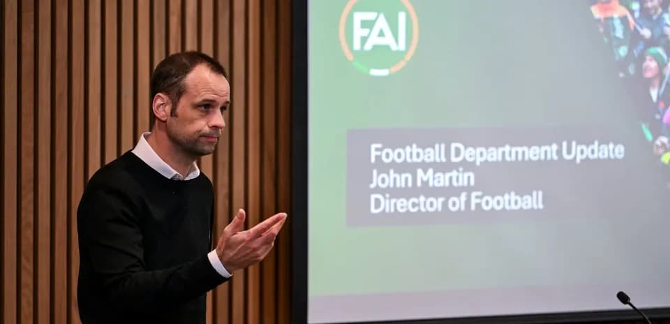 John Martin speaking at football department update event