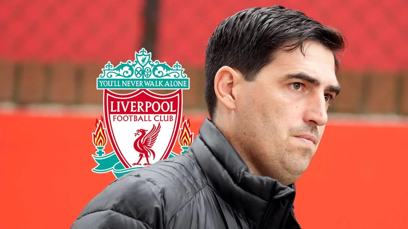 Coach in front of Liverpool FC logo backdrop