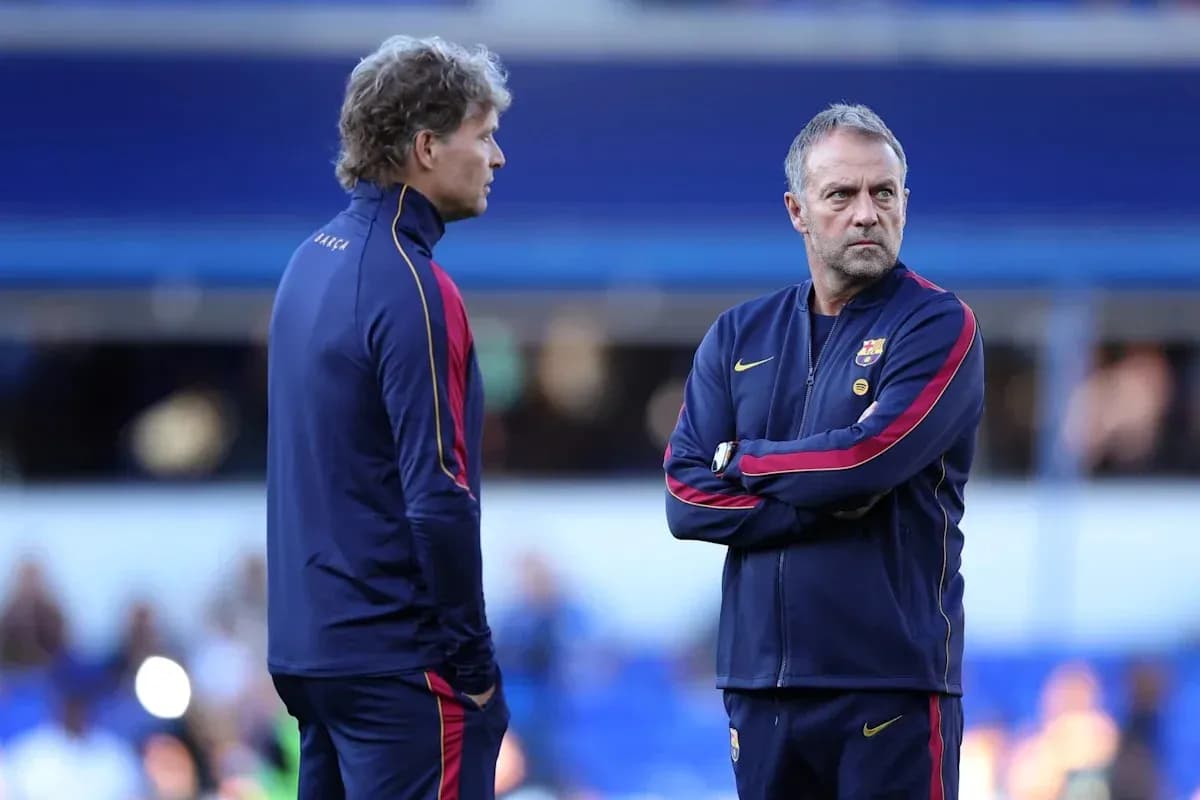 Two coaches discussing strategy before the match