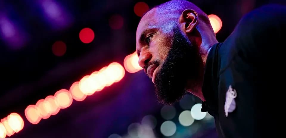 Basketball player in profile with colorful lights