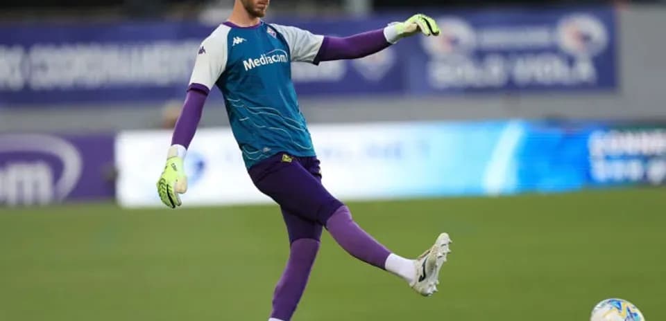 Goalkeeper practicing kick during training session