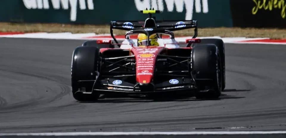 Formula 1 car racing on a track corner
