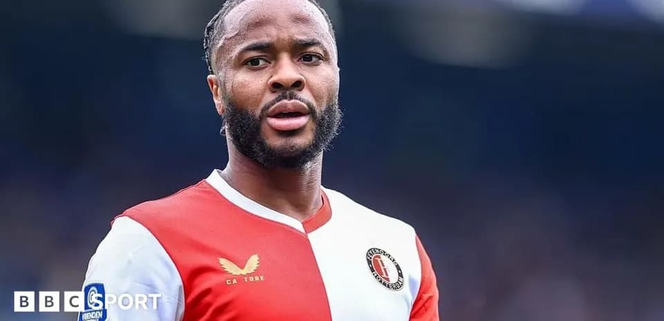 Feyenoord player in red and white jersey during match