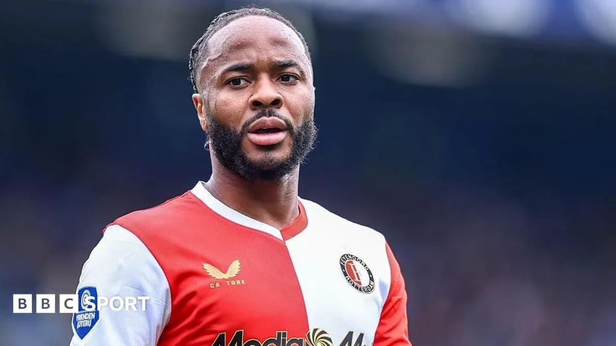 Feyenoord player in red and white jersey during match