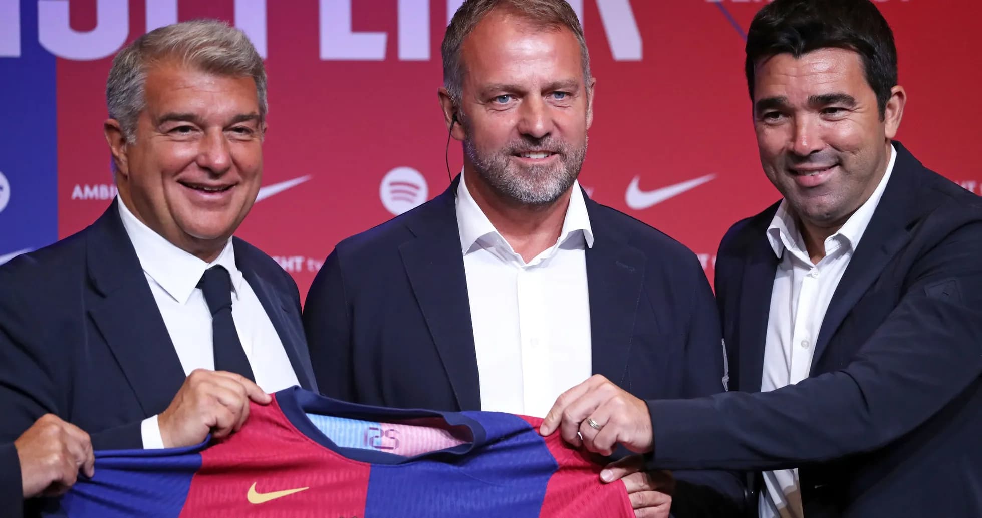 Barcelona officials presenting new coach at press conference
