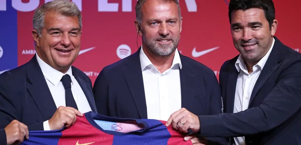 Barcelona officials presenting new coach at press conference