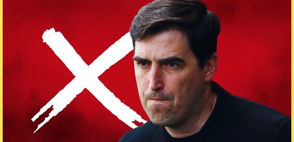 Coach with serious expression on red background