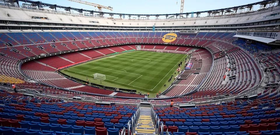 Camp Nou stadium with empty stands and pitch