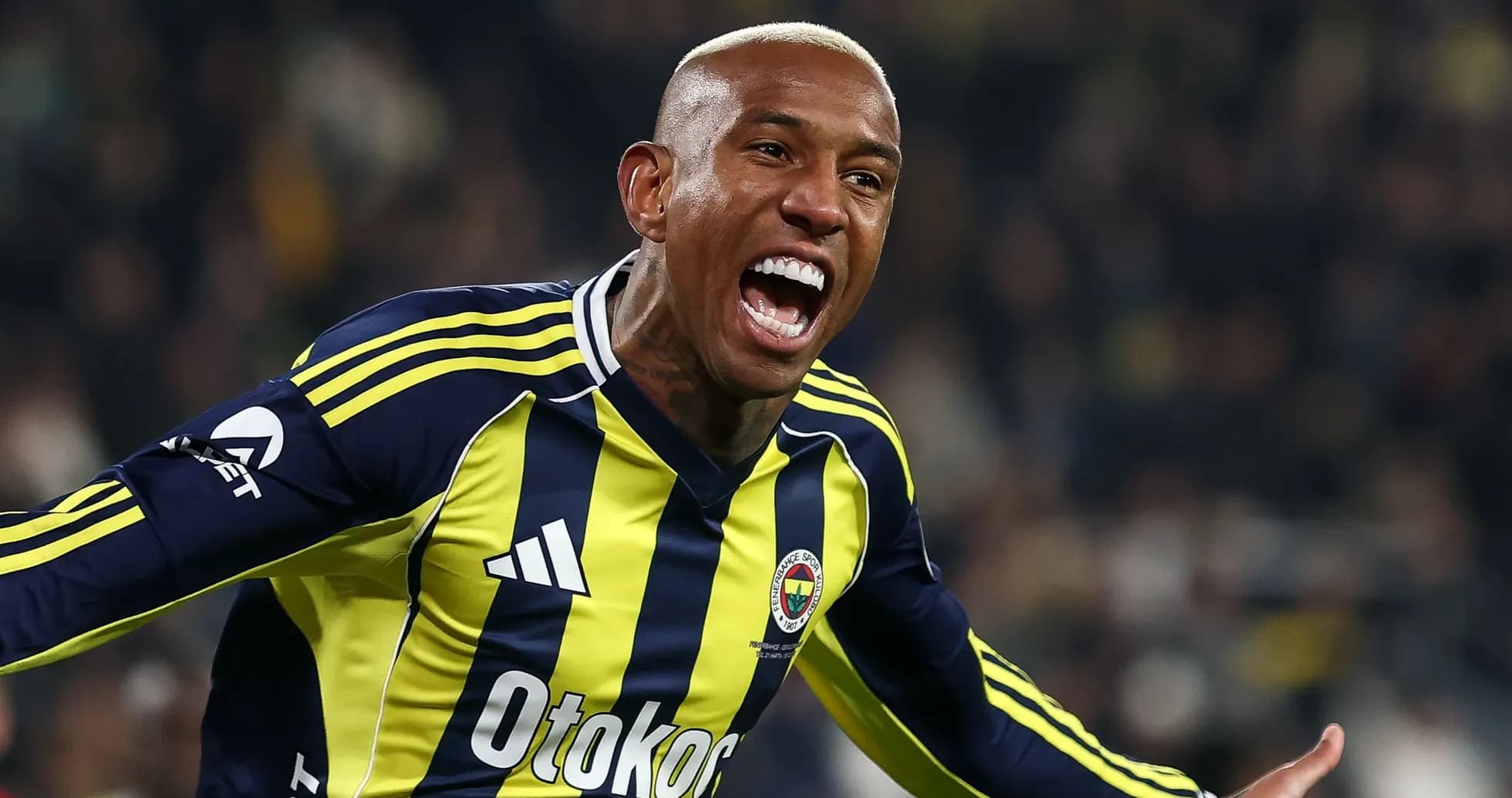 Fenerbahçe player celebrating a goal on field