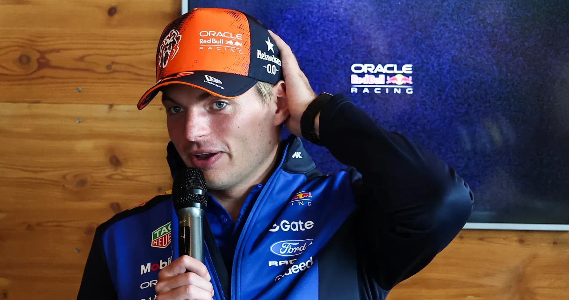 Formula 1 driver speaking at press event