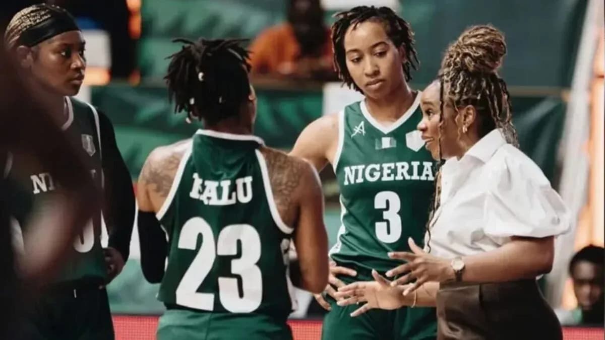 Nigeria women's basketball team discussing strategy during timeout