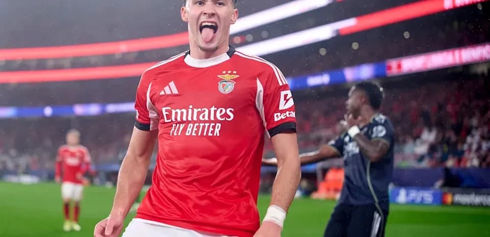 Benfica player celebrating a goal on the field