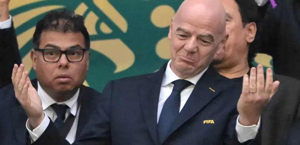 FIFA officials at an event with mixed expressions