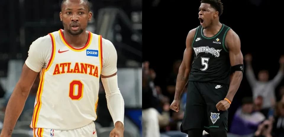 Duo of basketball players in game action
