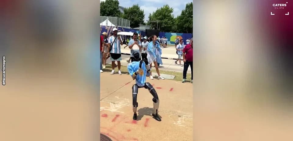 Robot performing dance in front of spectators
