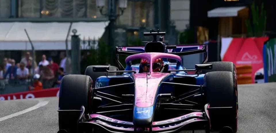 Formula 1 car racing on a city street circuit