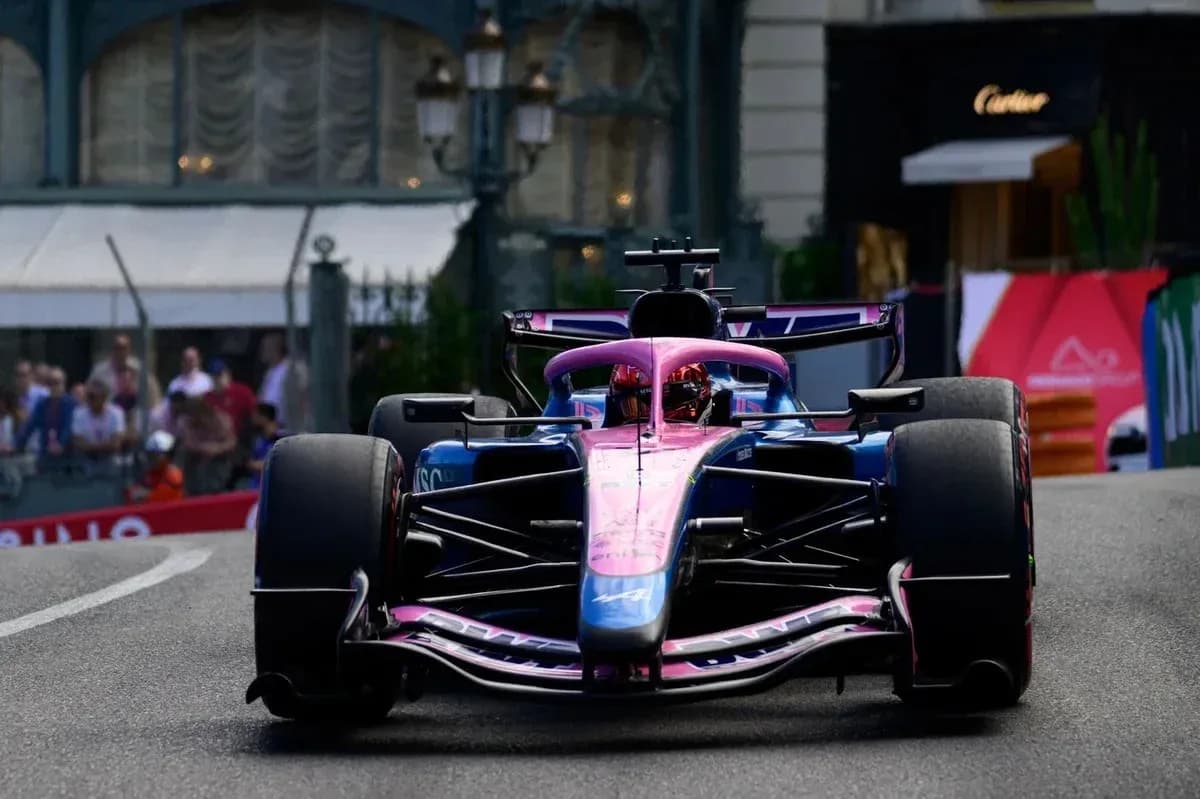 Formula 1 car racing on a city street circuit
