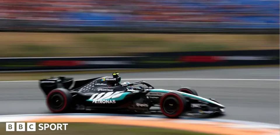 Formula 1 car speeding on the racetrack