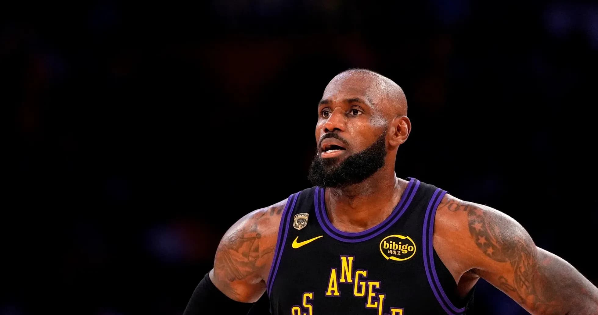 Basketball player in Los Angeles Lakers jersey on court