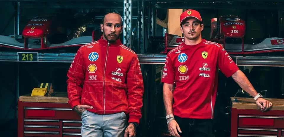 Lewis Hamilton and Charles Leclerc in Ferrari team gear
