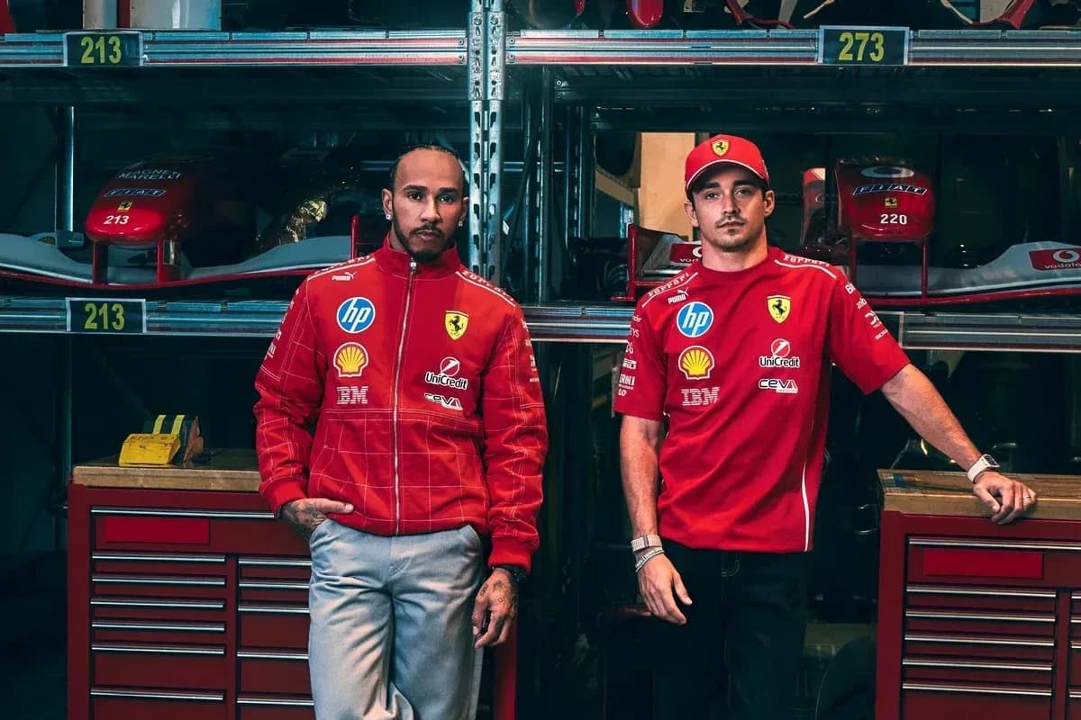 Lewis Hamilton and Charles Leclerc in Ferrari team gear