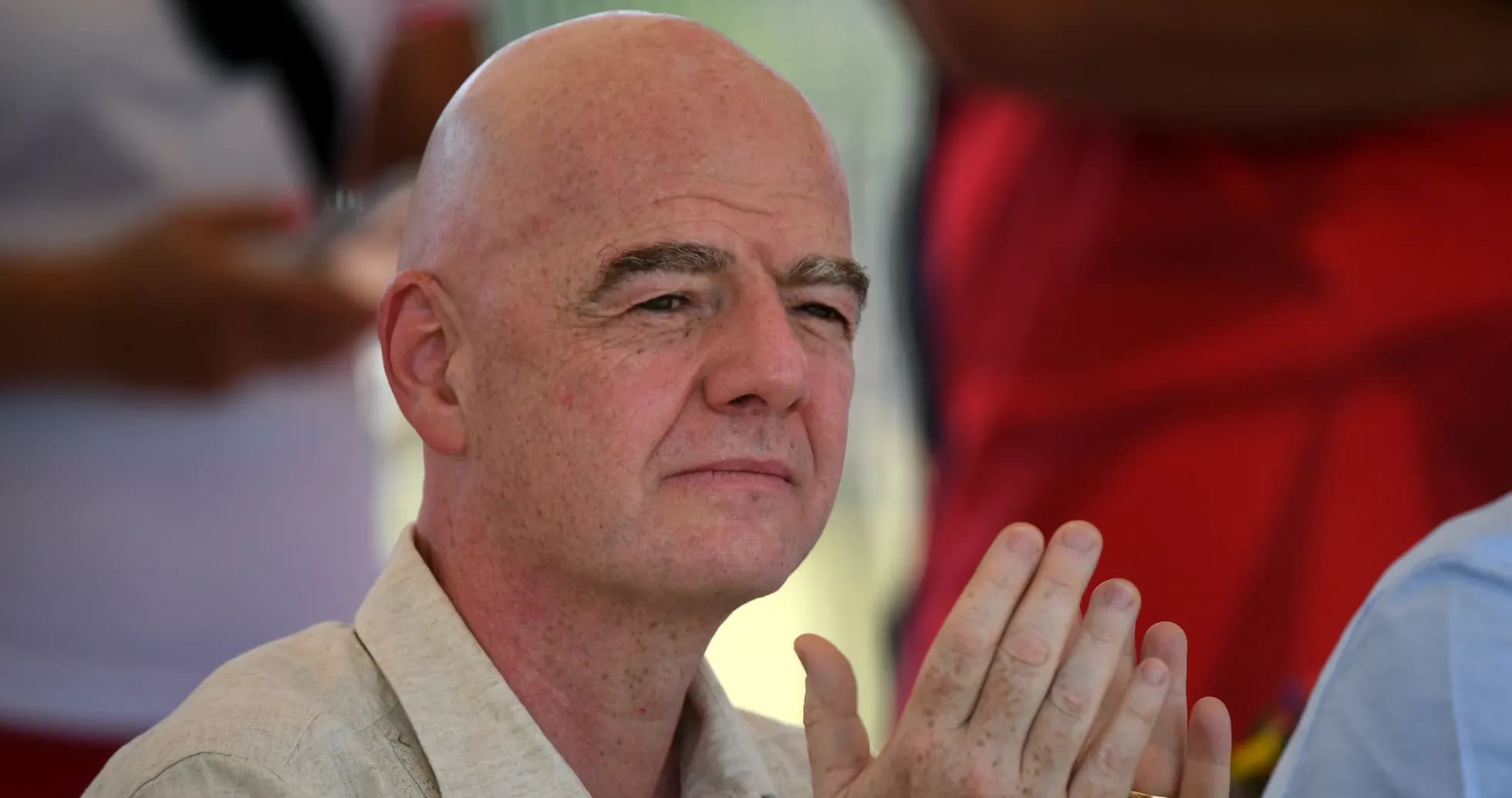 Man clapping during an outdoor event