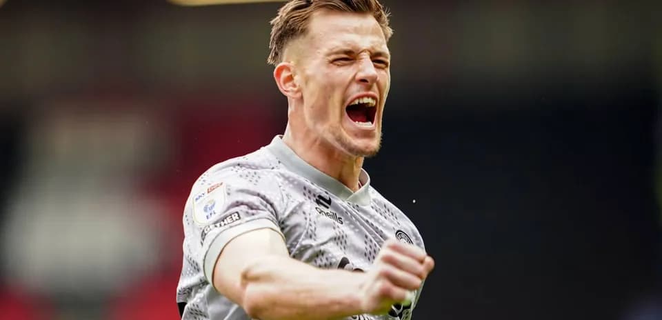 Player celebrating passionately after a successful play