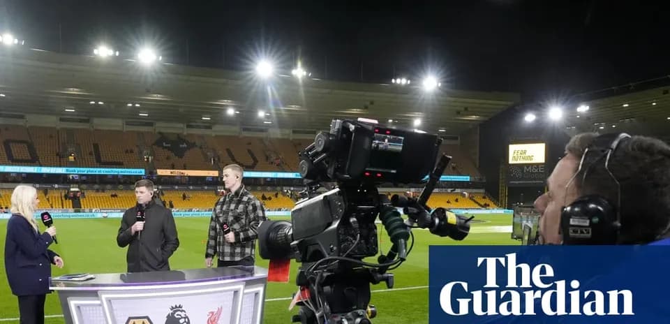Television presenters discussing match at stadium