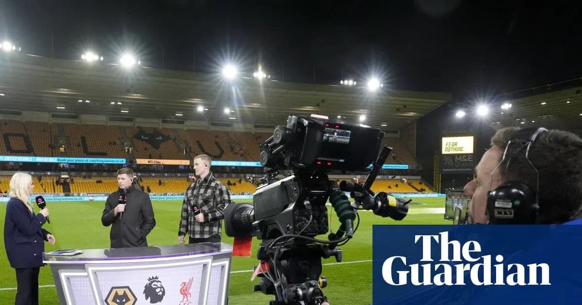 Television presenters discussing match at stadium