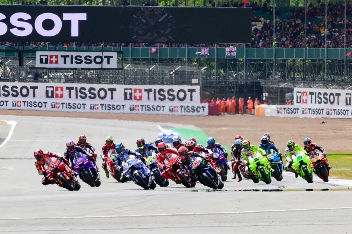 Motorsport race with multiple riders on track