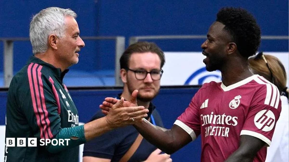 Mourinho and player shaking hands on the pitch