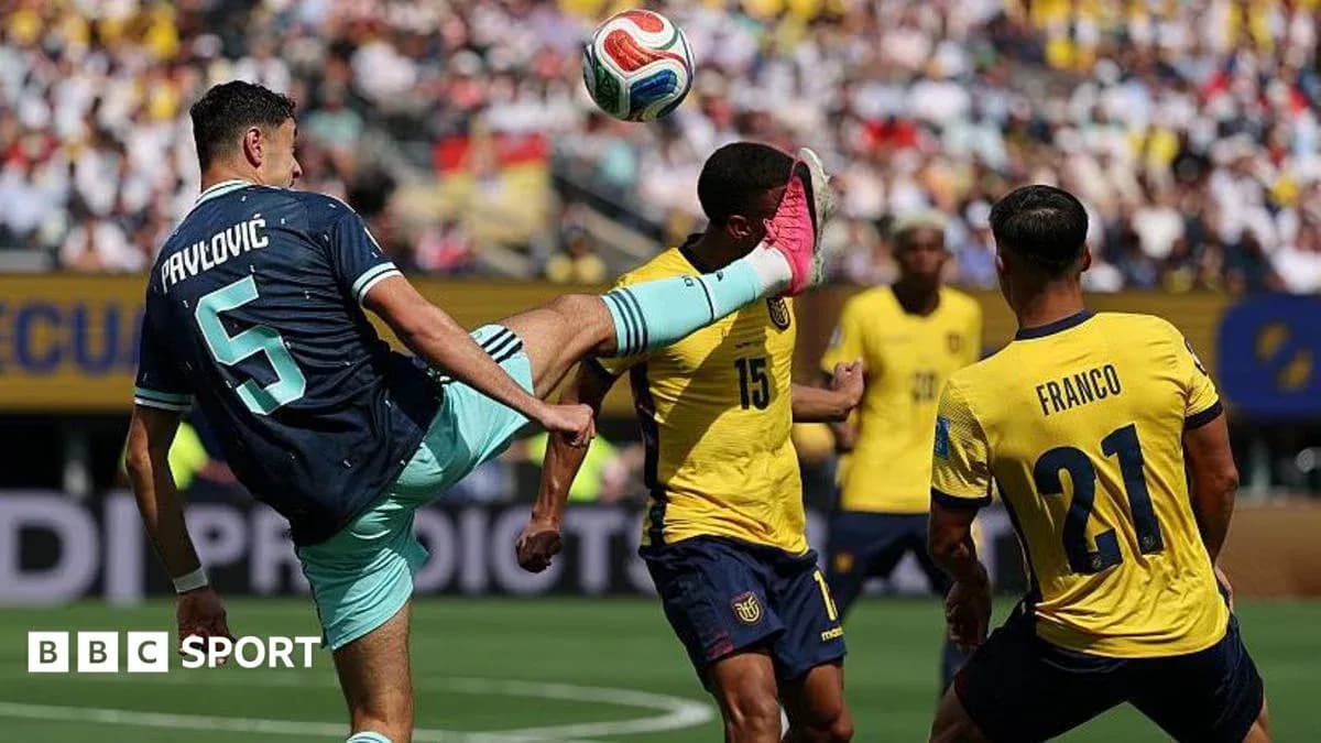 Player kicking ball during match between teams