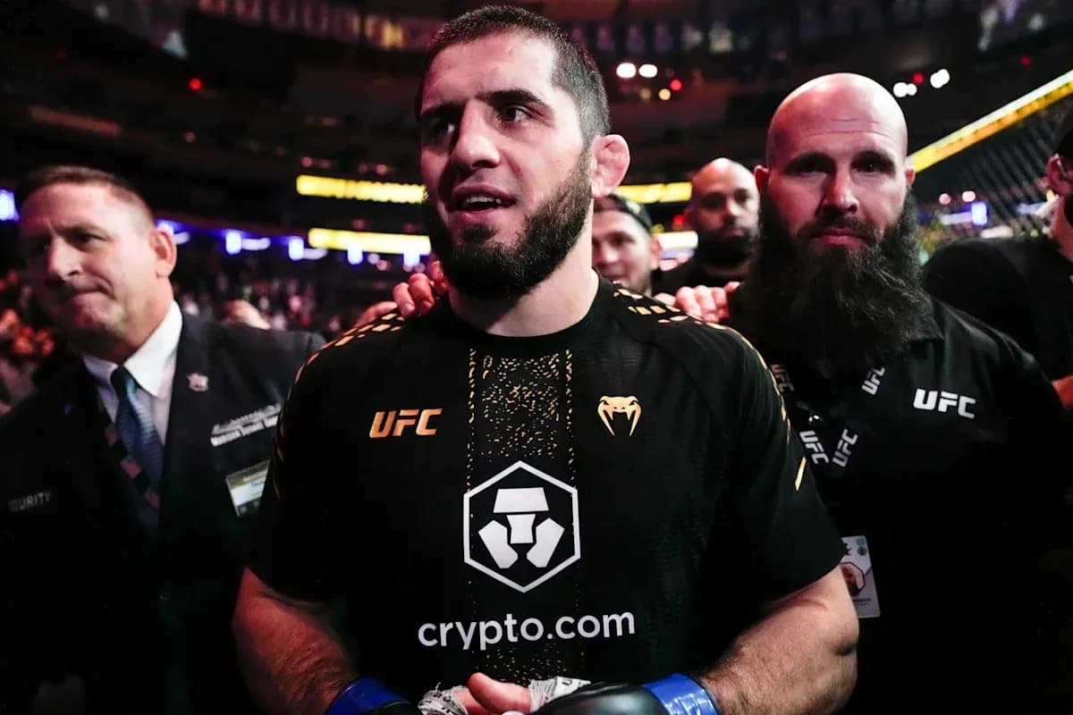 MMA fighter entering the arena with support team