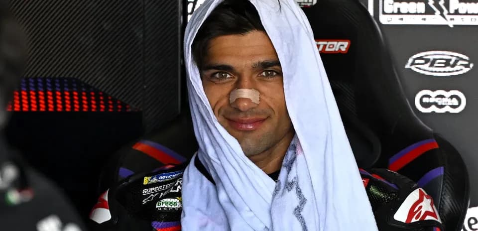 Motorsport athlete wearing a towel and bandage