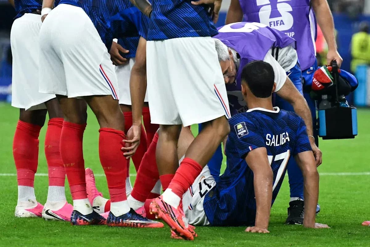 Saliba receiving medical attention on the field