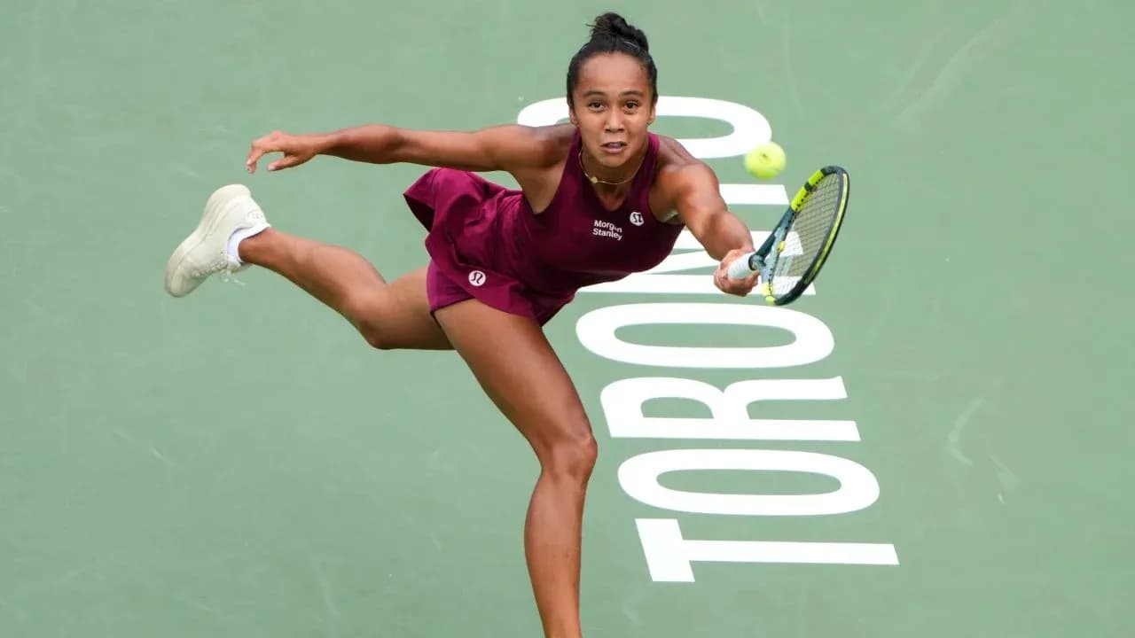 Tennis player executing a backhand shot in Toronto