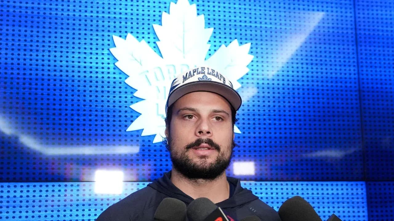 Player speaking at press conference with media