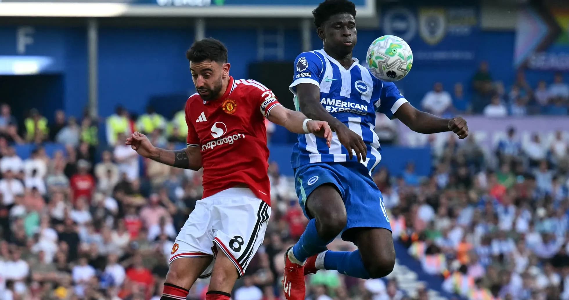 Bruno Fernandes and defender challenging for the ball