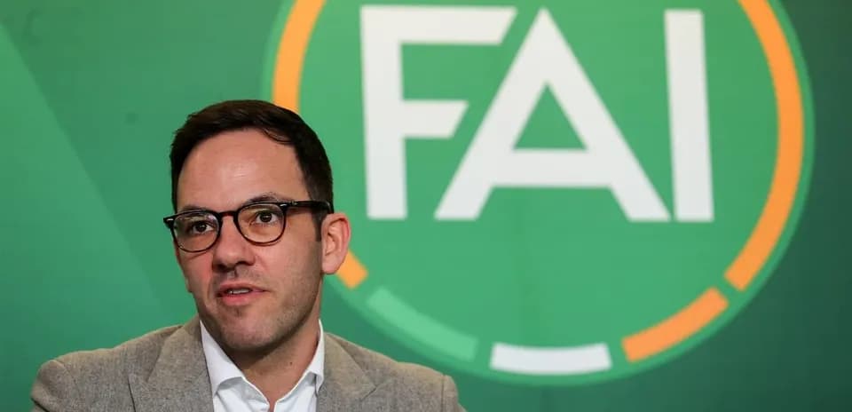 Spokesperson at FAI press conference backdrop