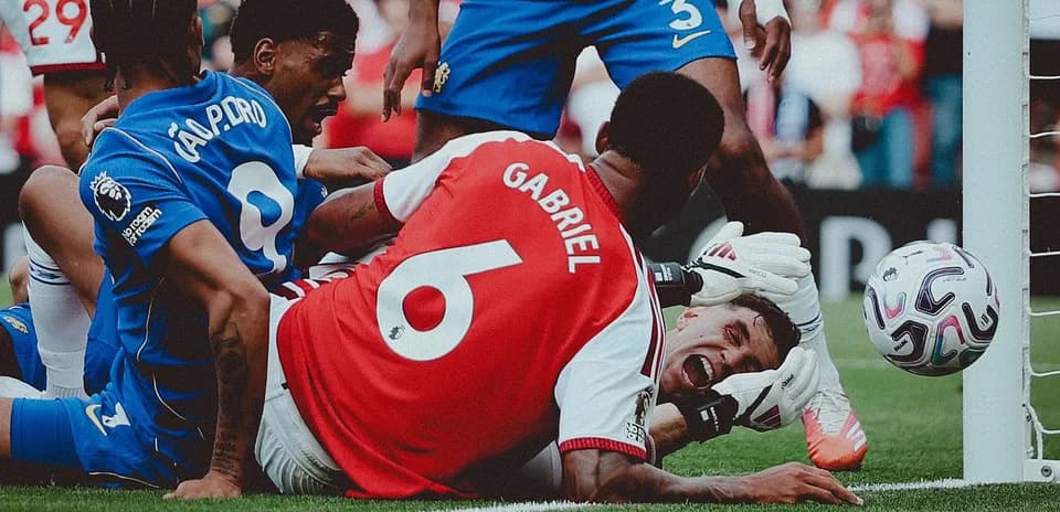 Players contesting near goal line during match