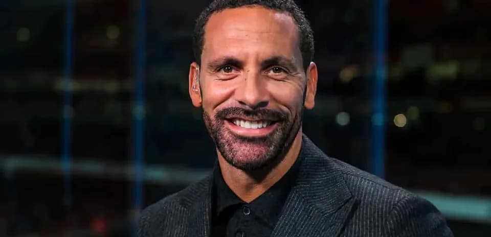 Analyst smiling during sports broadcast segment